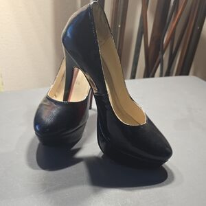 Christian Louboutin Glossy Black Heels with Red Sole